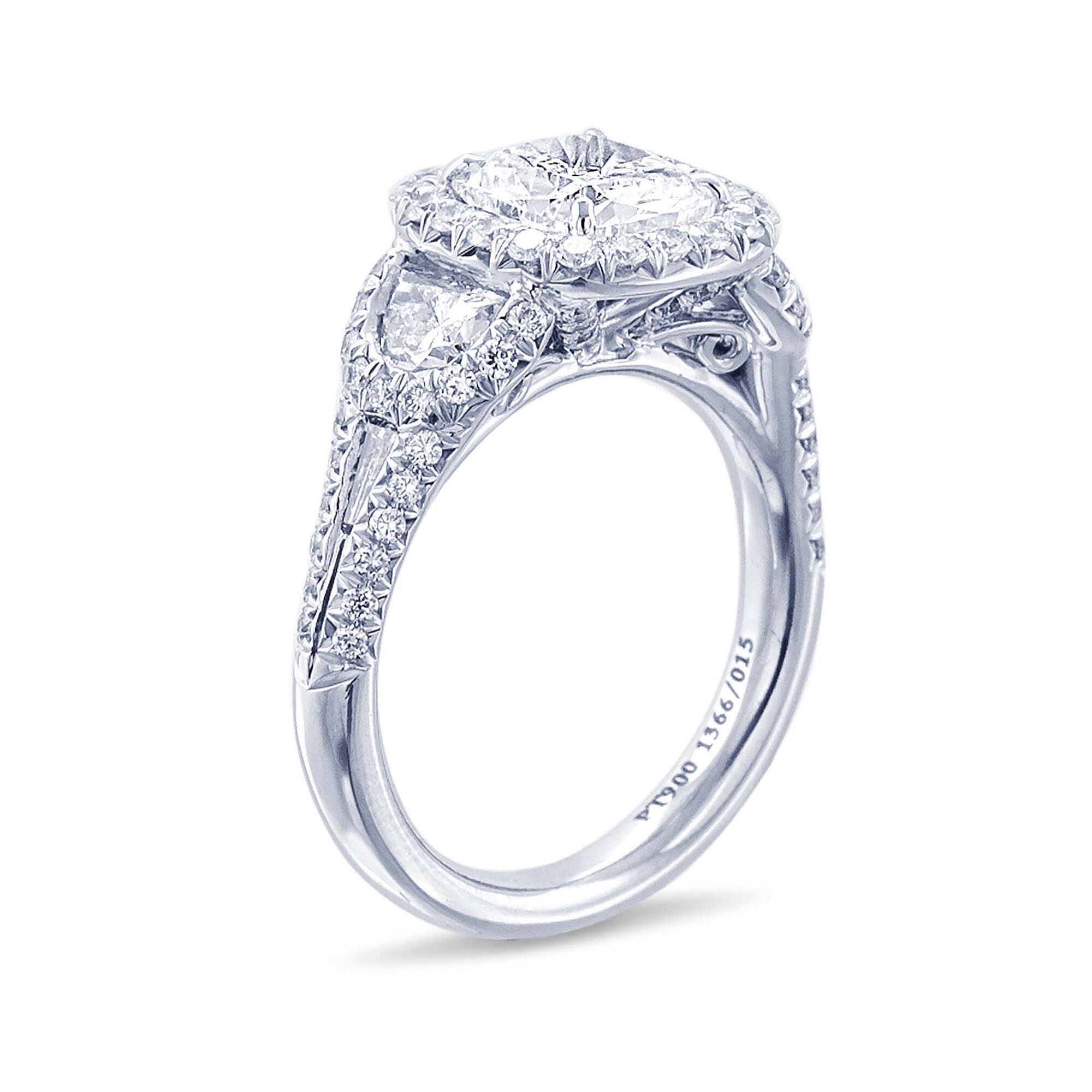 Three-Stone Cushion-Cut Diamond Engagement Ring with Single Halo